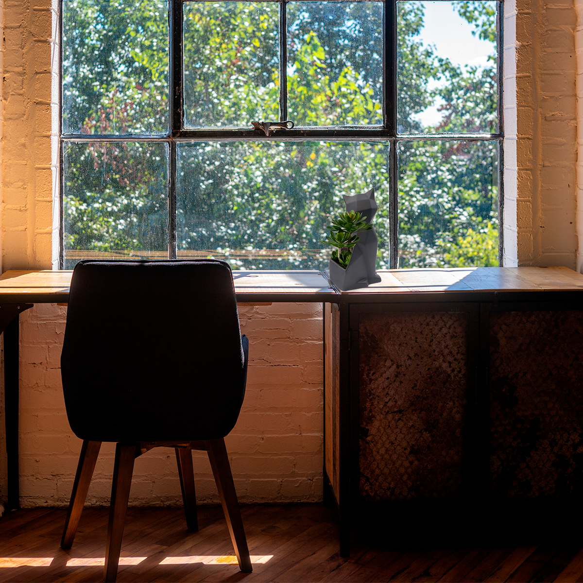 Maceta en forma de gato geométrico de cerámica mate