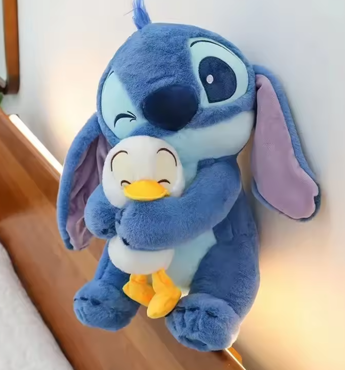 Peluche Stitch con patito